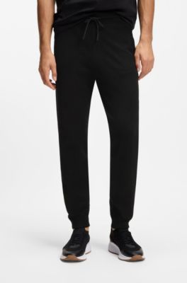 Knitted tracksuit bottoms in a regular fit, Black
