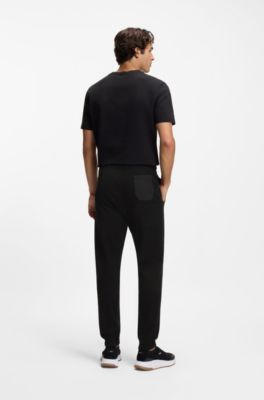 Knitted tracksuit bottoms in a regular fit, Black