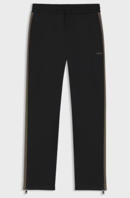 Relaxed-fit tracksuit bottoms with logo tape, Black
