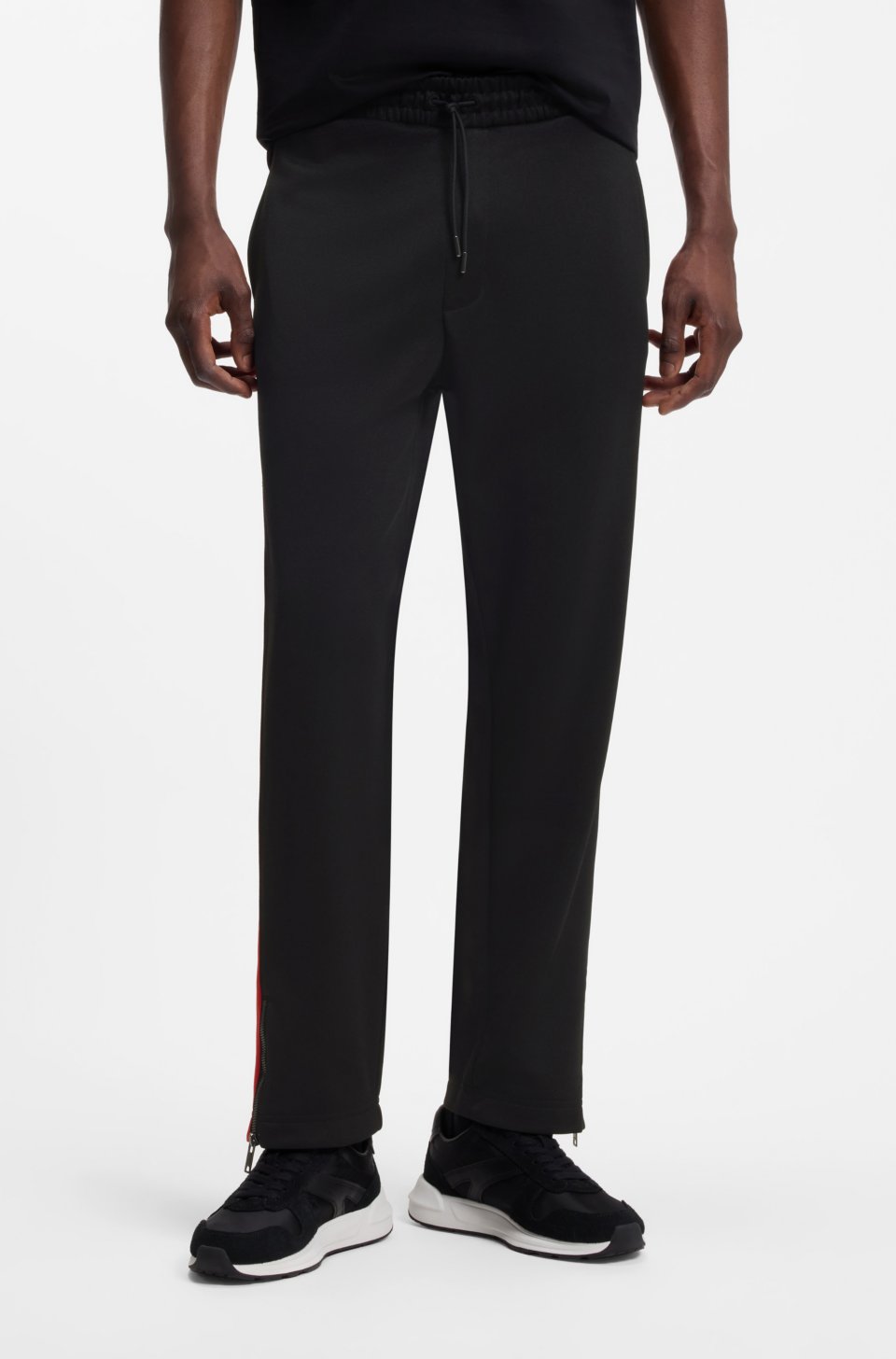 Relaxed-fit tracksuit bottoms with logo tape