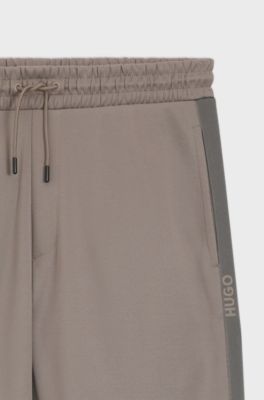 Pantaloni della tuta relaxed fit con banda con logo, Marrone chiaro