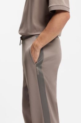 Pantaloni della tuta relaxed fit con banda con logo, Marrone chiaro