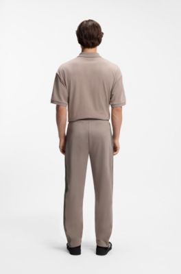 Pantaloni della tuta relaxed fit con banda con logo, Marrone chiaro