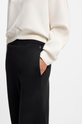 Cotton-blend tracksuit bottoms with lustrous piping, Black