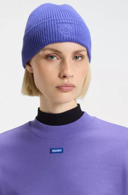 Beanie hat with Happy HUGO logo