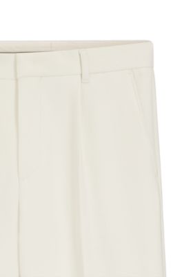 Tapered-fit trousers in stretch fabric, White
