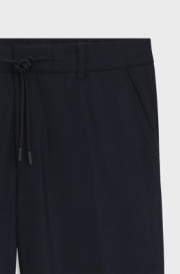 Pantaloni in flanella elasticizzata spazzolata con fit affusolato, Blu scuro