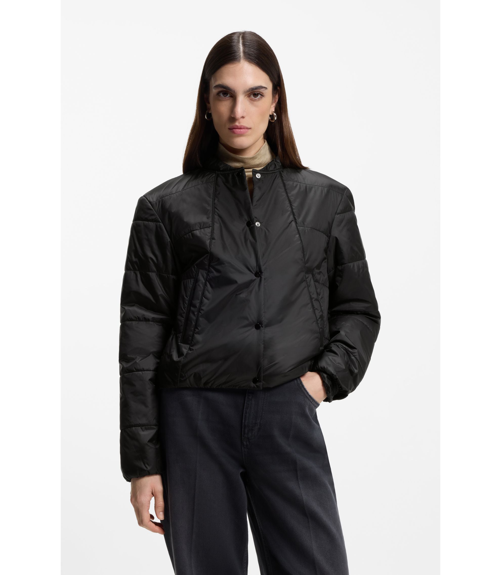 Verstaubare Jacke aus schimmerndem, wasserabweisendem Gewebe
