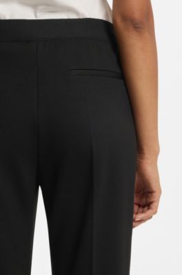 Relaxed-fit trousers in stretch jersey, Black