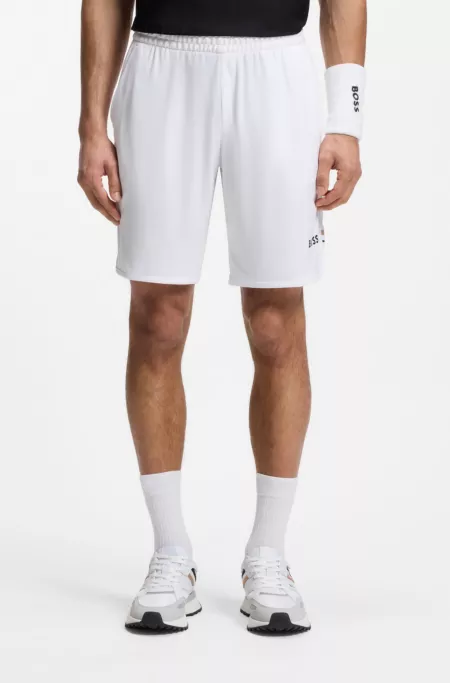 Quick-dry shorts in stretch fabric with pocket bags