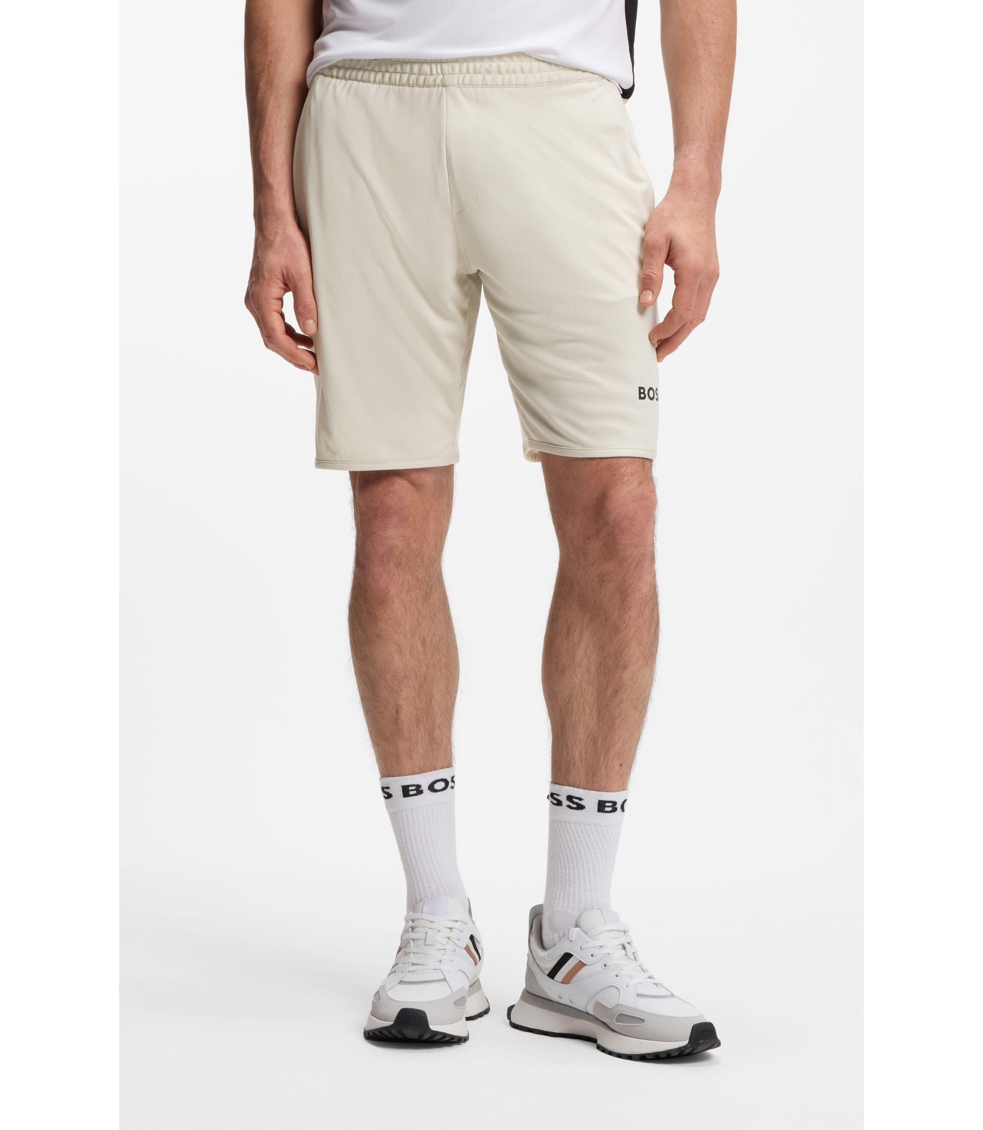 Schnell trocknende Shorts aus Stretch-Gewebe mit Taschen