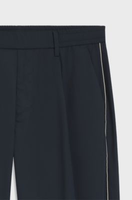 Tapered-fit trousers with water-repellent finish, Dark Blue
