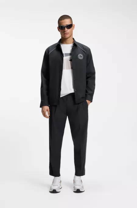 Tapered-fit trousers with water-repellent finish