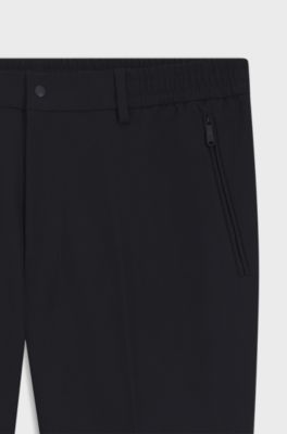 Tapered-fit trousers in water-repellent fabric, Black