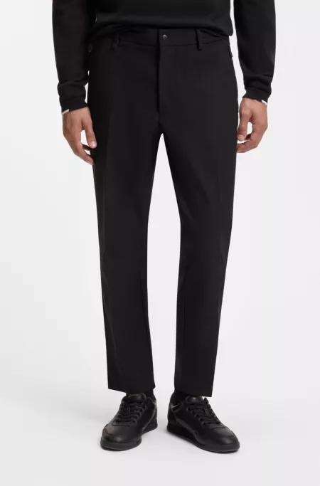 Tapered-fit trousers in water-repellent fabric