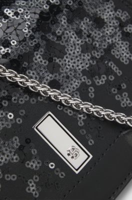 Ariell leather clutch bag with sequin embellishments, Black