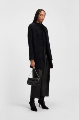 Ariell leather clutch bag with sequin embellishments, Black