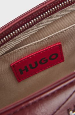 Stitched faux-leather shoulder bag with stacked-logo hardware, Dark Red