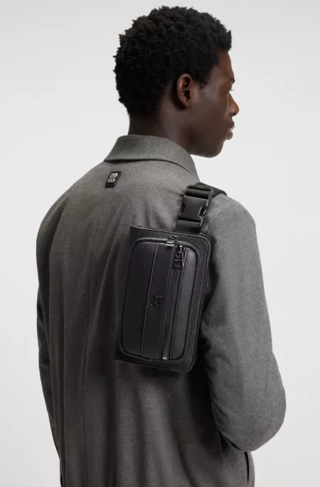 Grained faux-leather belt bag with stacked-logo trim