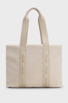Borsa tote in shearling sintetico con tracolla con logo, Colore neutro