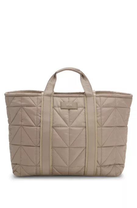 Quilted tote bag with logo patch