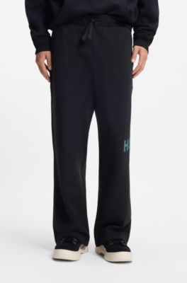 Cotton-terry tracksuit bottoms with logo print, Black