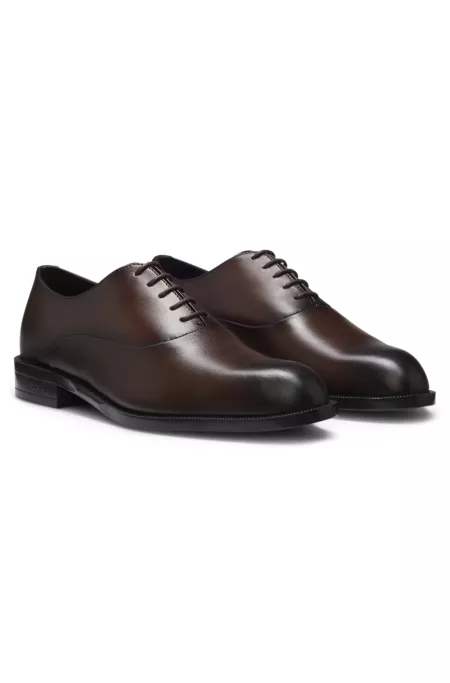 Oxford shoes in leather with heel logo