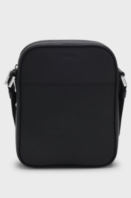 Reporter bag in plain and textured leather, Black