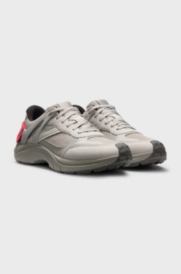 Logo-spoiler trainers in mesh and faux suede, Light Grey