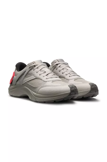 Logo-spoiler trainers in mesh and faux suede
