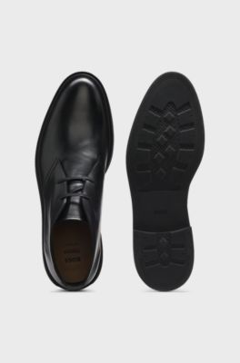 Leather desert boots with signature stripe, Black