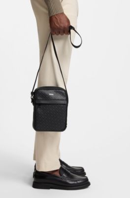 Monogram reporter bag with foil-embossed logo, Black