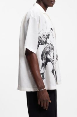 Pearl cuff with metal logo plaque, Silver tone