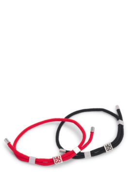 Two-pack of cord cuffs with logo plaques, Patterned