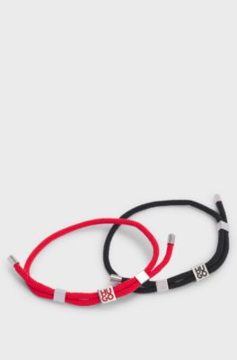 Two-pack of cord cuffs with logo plaques, Patterned