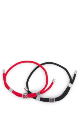 Two-pack of cord cuffs with logo plaques, Patterned
