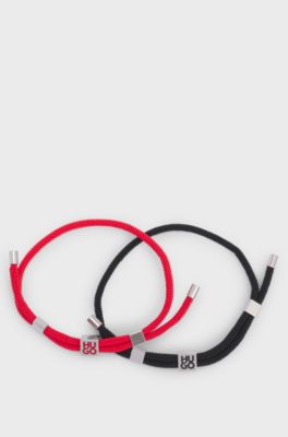 Two-pack of cord cuffs with logo plaques, Patterned