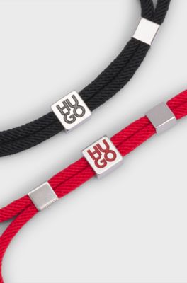 Two-pack of cord cuffs with logo plaques, Patterned
