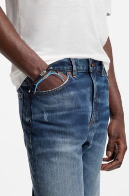 Due polsini con cordoncino e placche con logo in confezione da due, A disegni