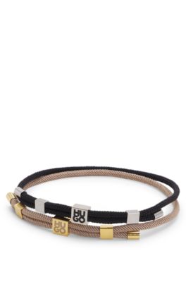 Two-pack of cord cuffs with logo plaques, Black