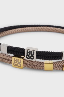 Two-pack of cord cuffs with logo plaques, Black