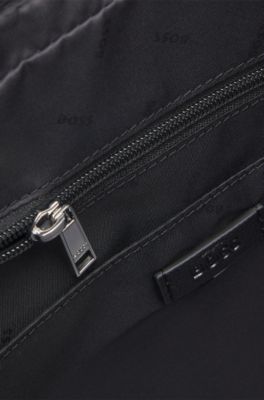 Grained faux-leather messenger bag with embossed logo, Black
