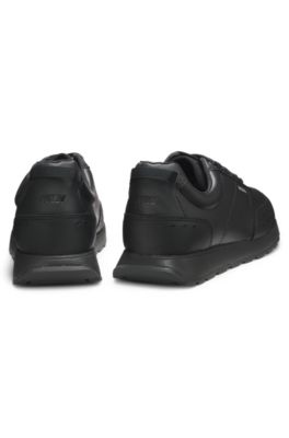 Sneakers stile runner in similpelle con dettagli lavorati, Nero