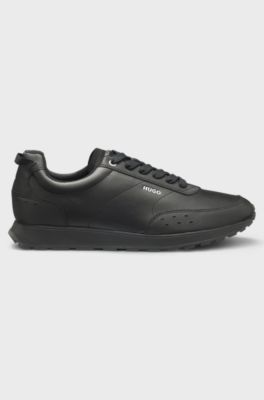 Running-inspired trainers in faux leather with structured details, Black