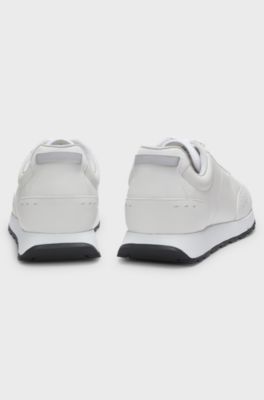 Running-inspired trainers in faux leather with structured details, White