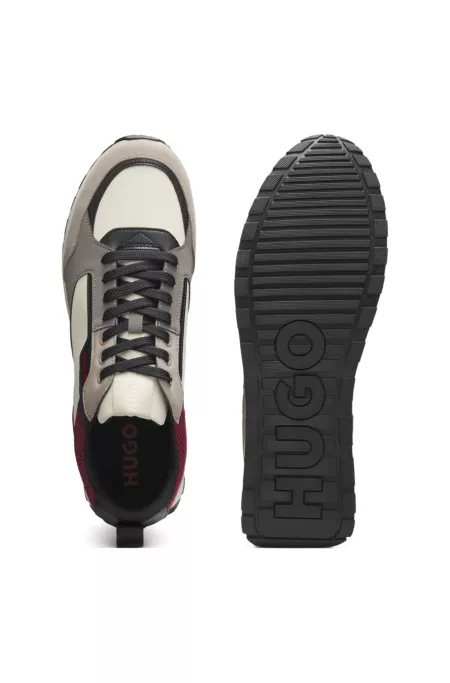 Baskets style chaussures de course avec finitions en mesh et cuir suédé