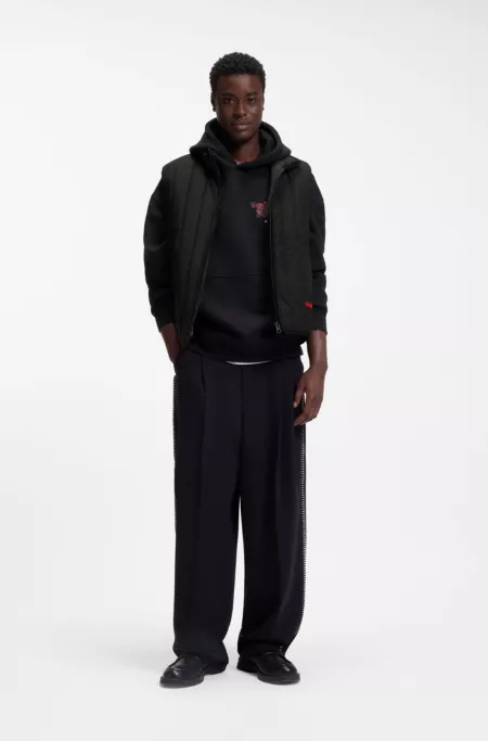 Vertical-quilted gilet with logo detail