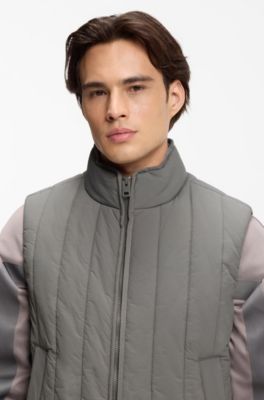 Chaleco con acolchado vertical y detalle de logo, Gris