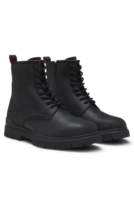 Leather half boots with embossed logo