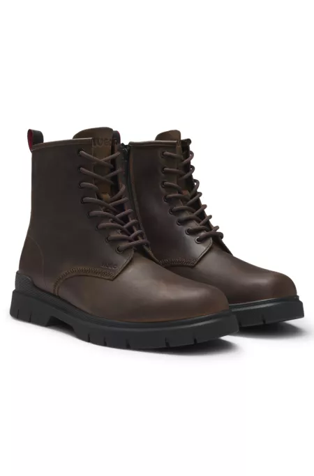 Leather half boots with embossed logo